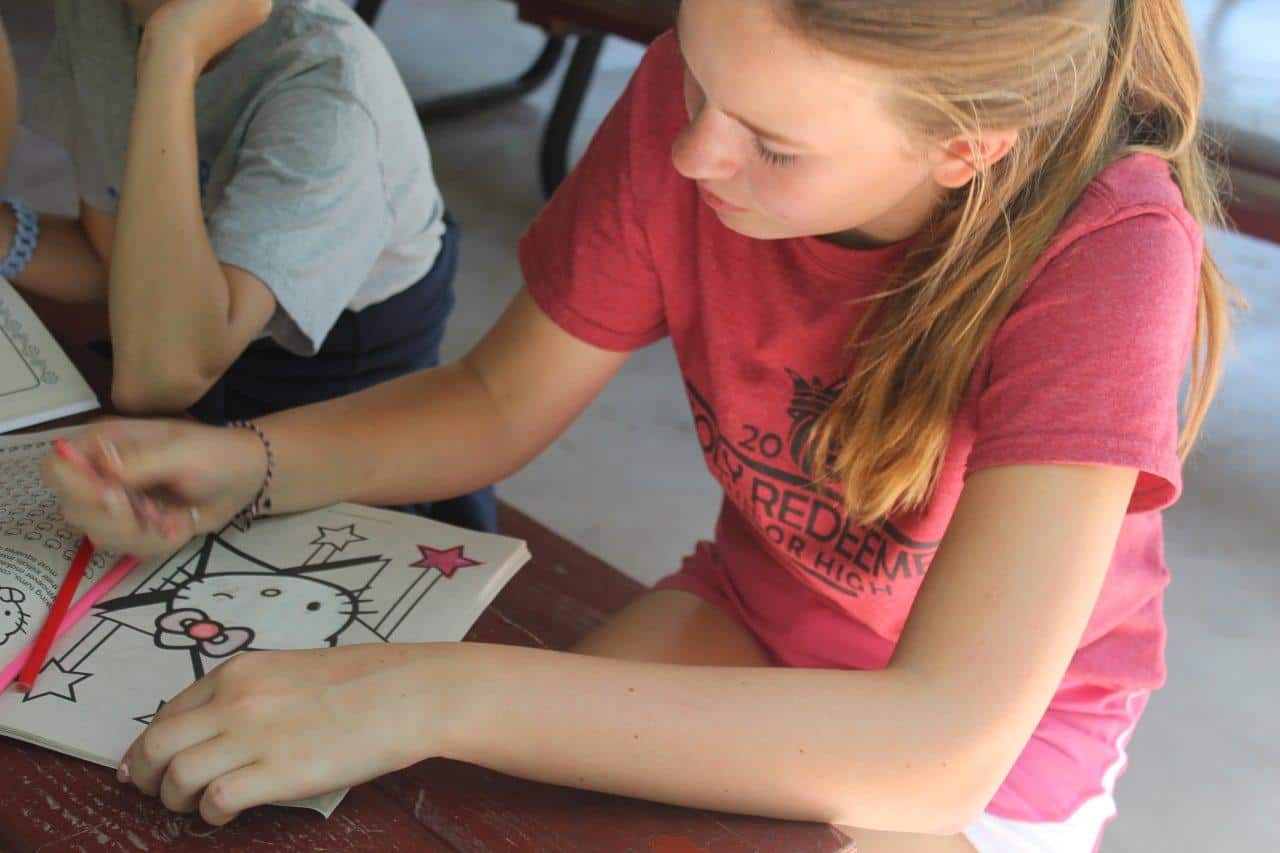 Girl coloring a picture